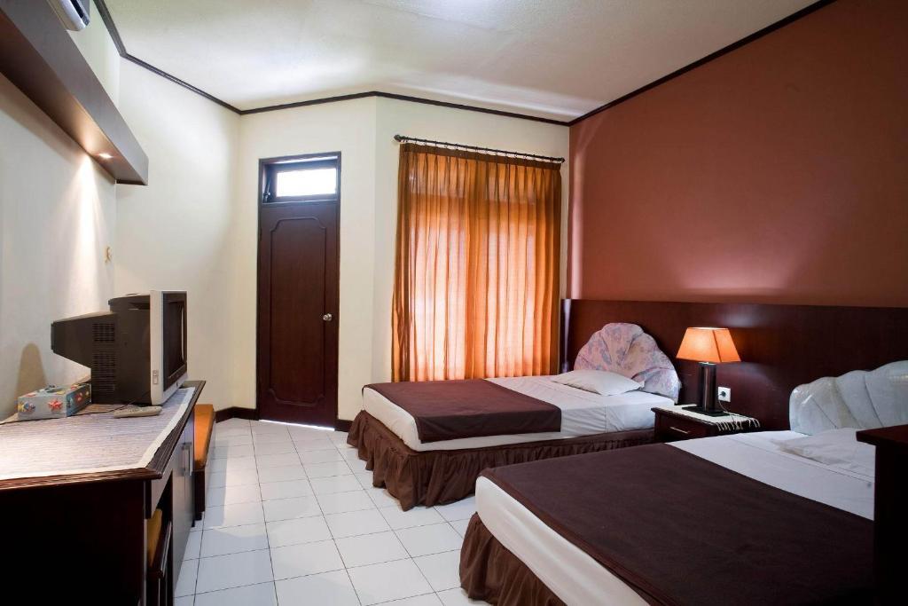 Dayu Hotel Kuta BALI Quarto foto